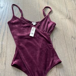 Garage. Bodysuit. Brand new. Tags